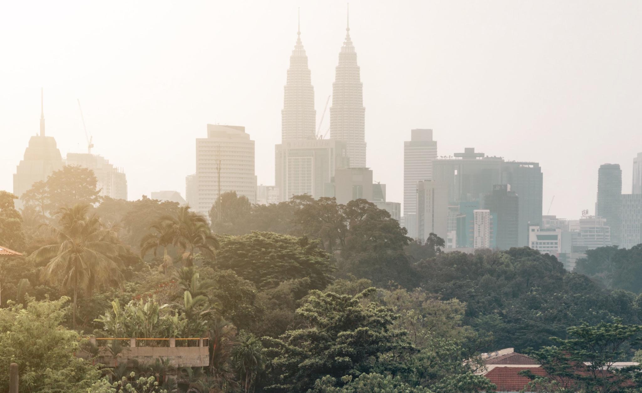 The view of the Petronas Towers in Malaysia, photo by Ming Han Low on Unsplash
