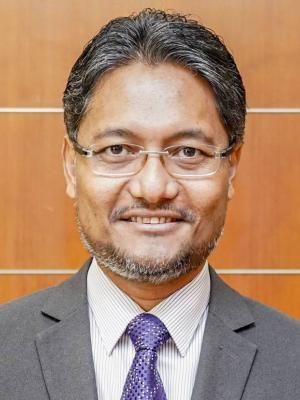 Associate Professor Marzuki Mohamad,